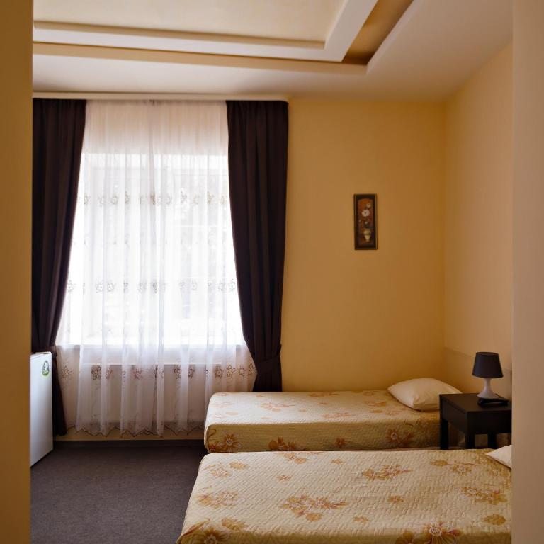 Двухместный (Стандартный двухместный номер с 2 отдельными кроватями) гостевого дома Плотниковых, Таганрог
