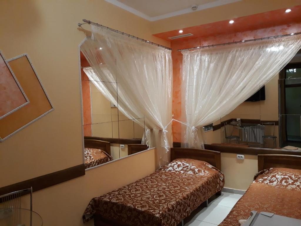 Двухместный (Бюджетный двухместный номер с 2 отдельными кроватями) отеля Горизонт, Таганрог
