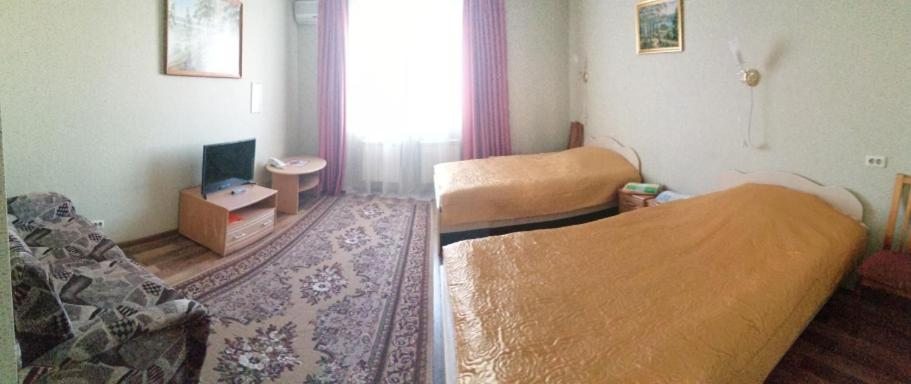Двухместный (Стандартный двухместный номер с 2 отдельными кроватями) гостевого дома Азалия, Череповец