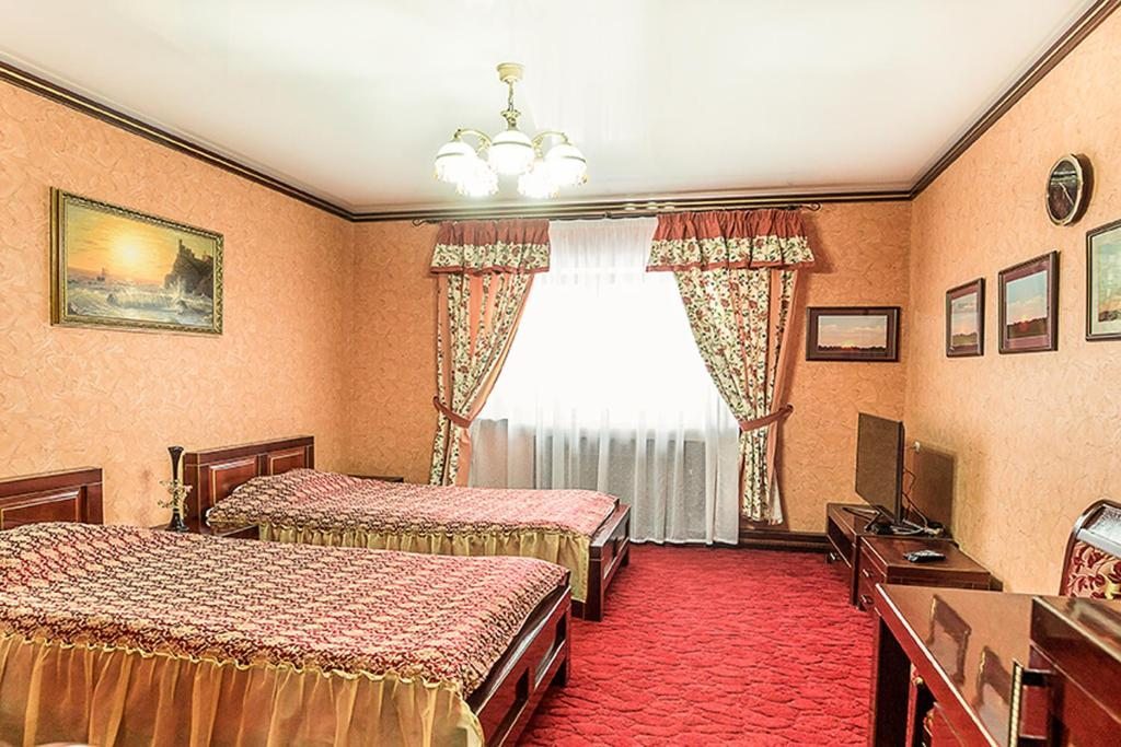 Двухместный (Стандартный двухместный номер с 2 отдельными кроватями) отеля В Боровске