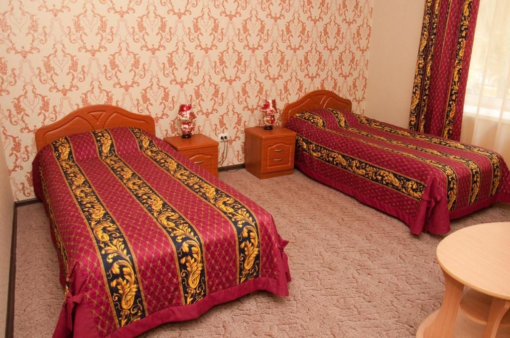 Двухместный (Двухместный номер с 2 двуспальными кроватями) отеля Колибри, Абакан