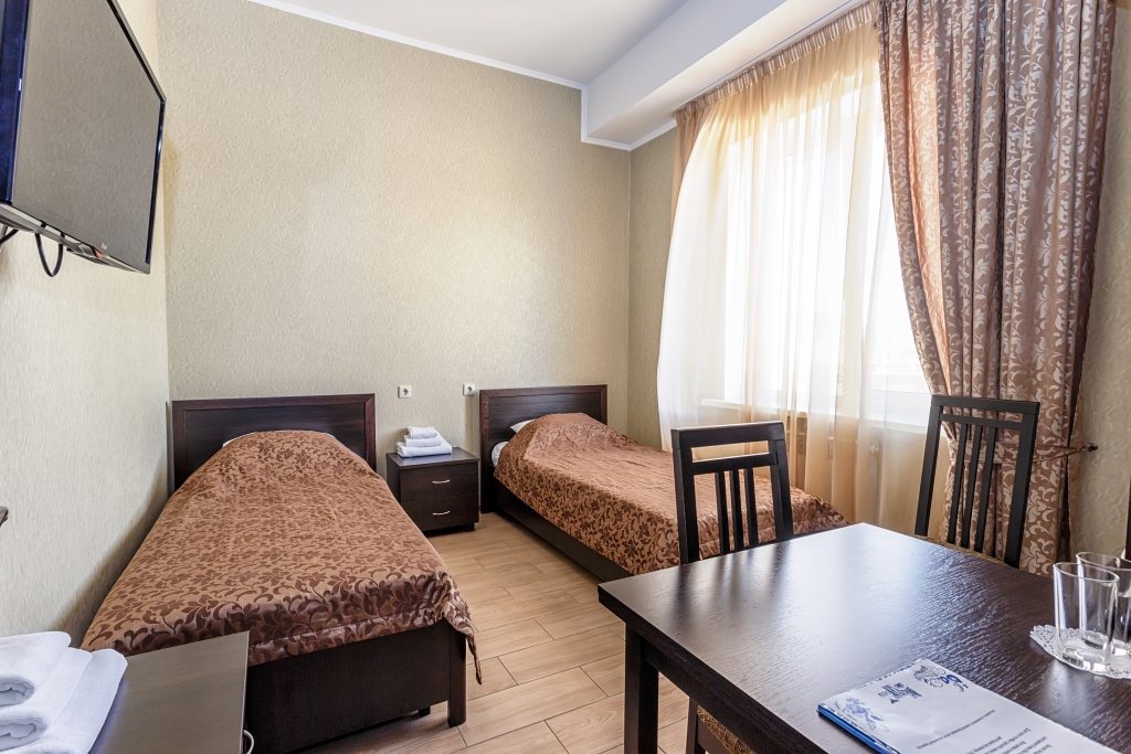Четырехместный (Стандарт) гостиничного комплекса Белые росы, Белгород