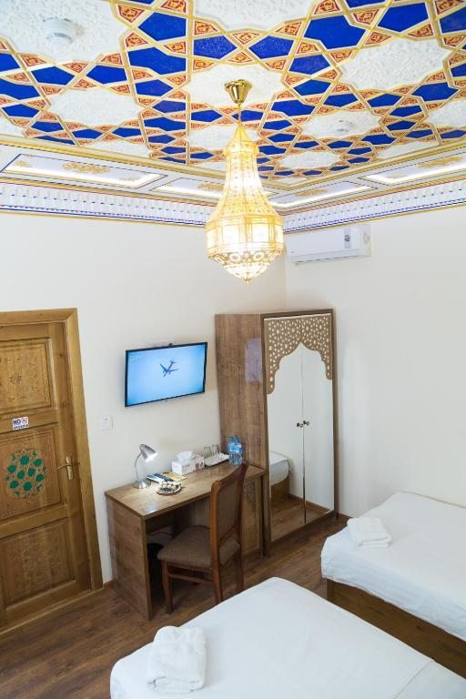 Двухместный (Двухместный номер с 2 отдельными кроватями и ванной комнатой) отеля Hotel Safiya, Бухара