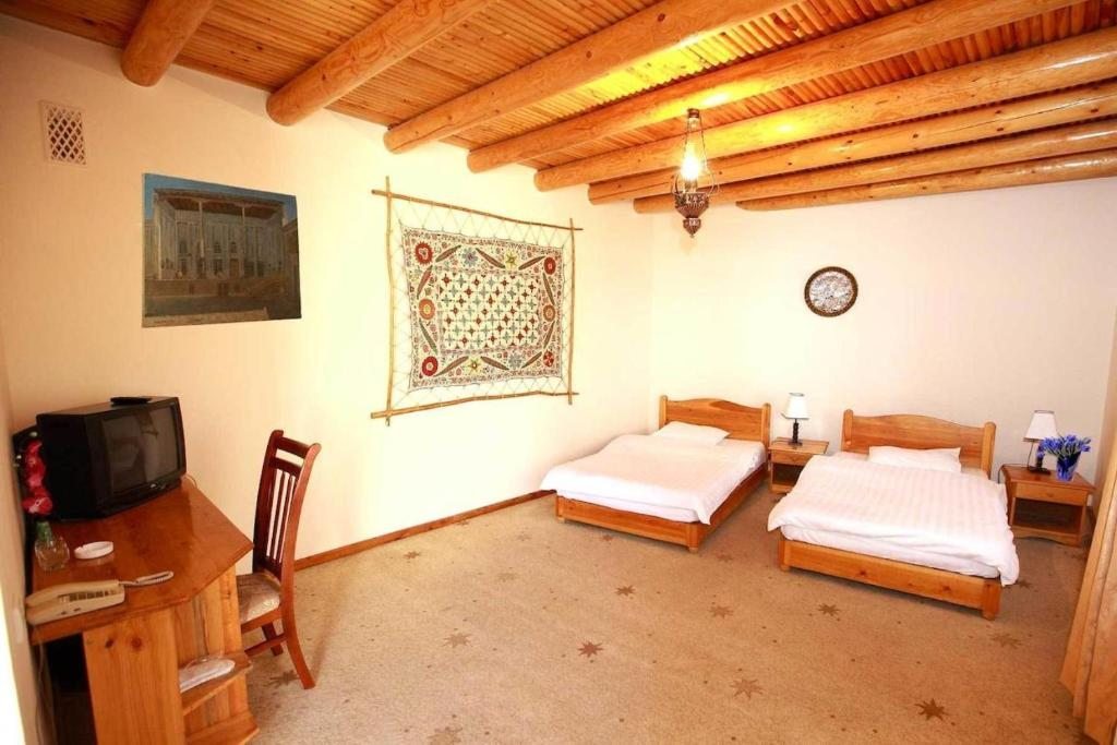 Двухместный (Стандартный двухместный номер с 1 кроватью или 2 отдельными кроватями) отеля Ляби-Хауз, Бухара