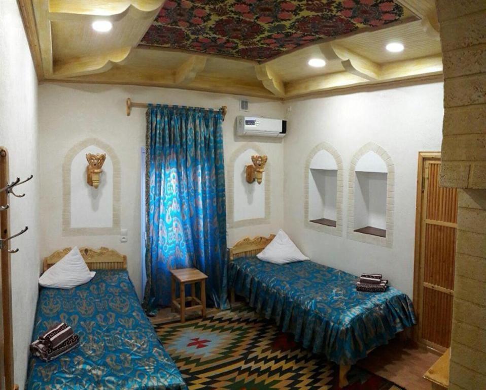 Двухместный (Стандартный двухместный номер с 2 отдельными кроватями) отеля Zukhro Boutique Hotel, Хива