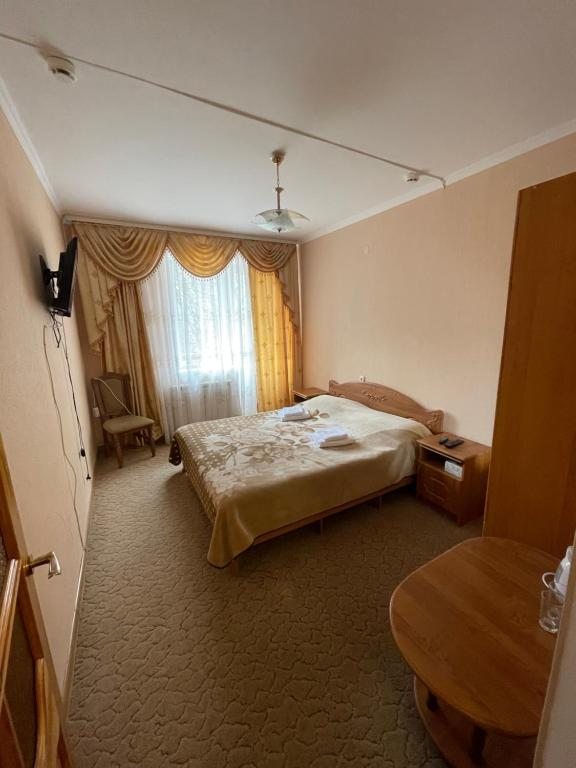 Двухместный (Двухместный номер Делюкс с 1 кроватью и балконом) отеля Лотос, Домбай