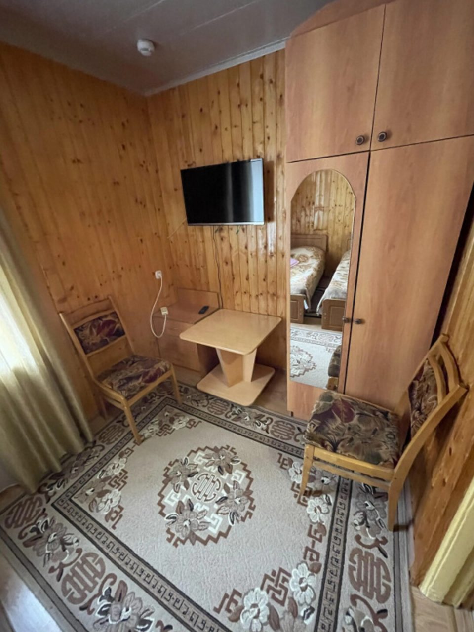 Комната двухместного стандартного номера с общей ванной