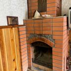 Камин в комнате отдыха в Сауне