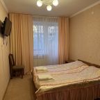 Две односпальные кровати можно объединить как на фотографии