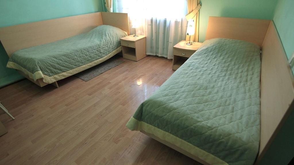 Двухместный (Стандартный двухместный номер с 2 отдельными кроватями) мини-отеля Дук, Углич