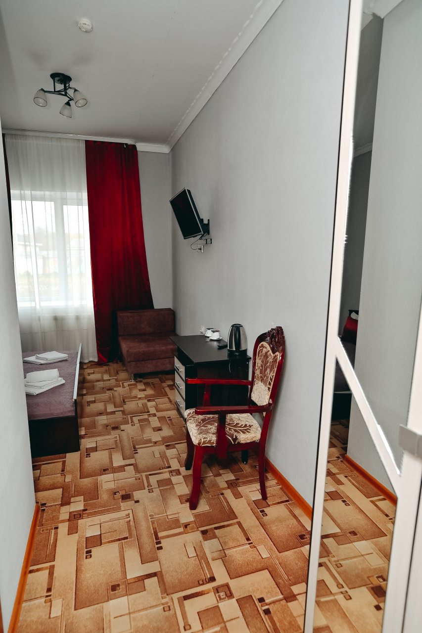 Уютный стандартный номер с двумя отдельными кроватями