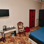 Просторный стандартный номер с двумя двуспальными кроватями