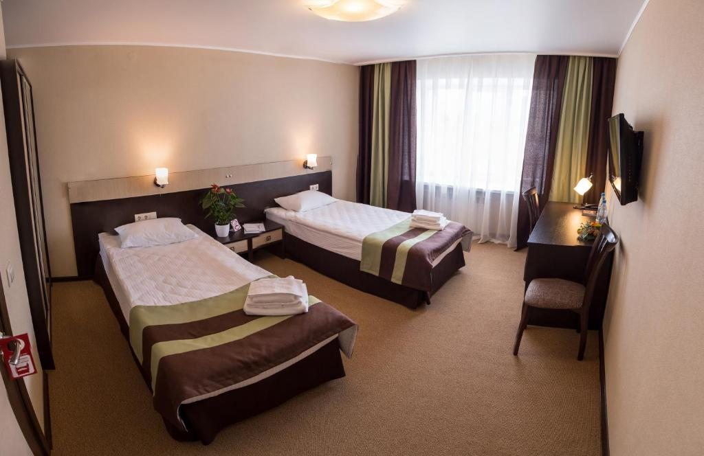 Двухместный (Стандартный двухместный номер с 2 отдельными кроватями) отеля Воробьевы Горы, Курган