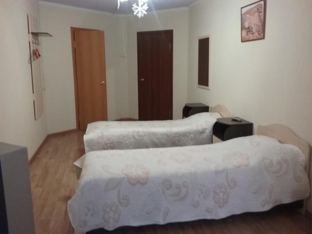 Двухместный (Двухместный номер с 2 двуспальными кроватями) мини-отеля Грааль, Владивосток
