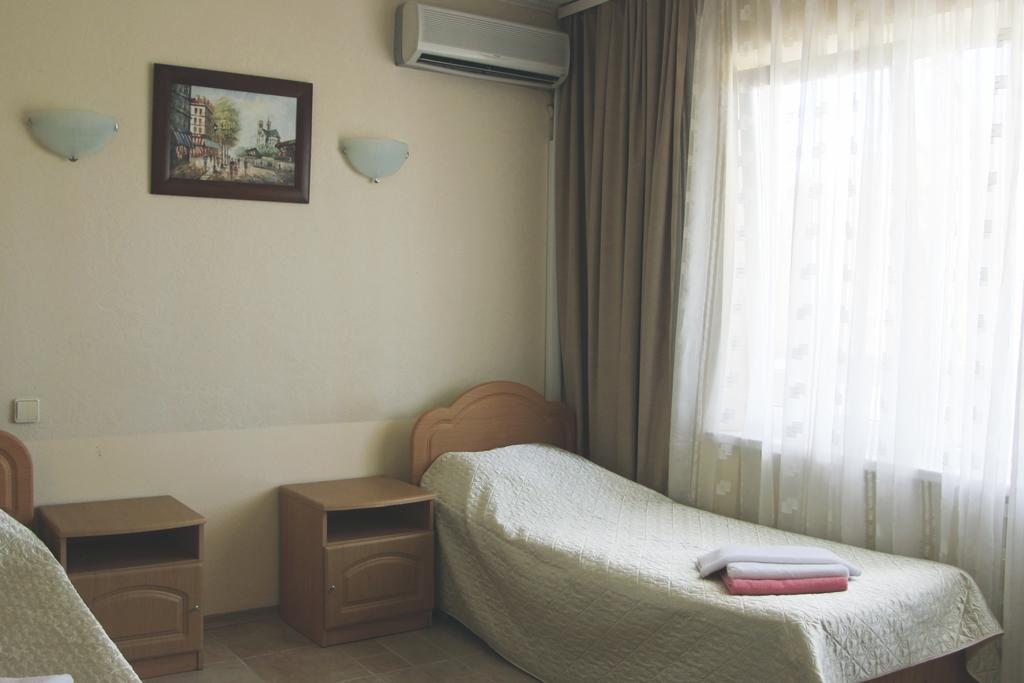 Двухместный (Стандартный двухместный номер с 2 отдельными кроватями) отеля Сокол, Лоо