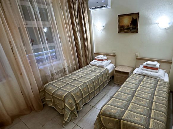 Фотография номера гостиницы Ателика Сокол