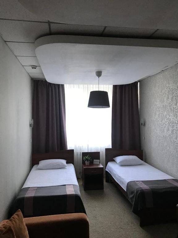 Двухместный (Стандартный двухместный номер с 1 кроватью или 2 отдельными кроватями) отеля Сити Плаза, Кемерово