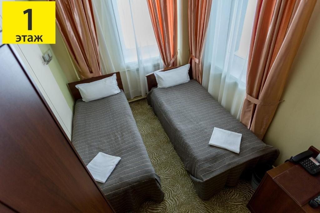 Двухместный (Бюджетный двухместный номер с 2 отдельными кроватями) гостиницы Грюнхоф, Шерегеш
