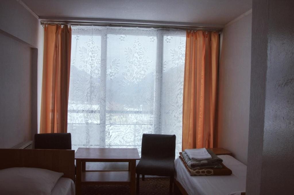 Номер (Односпальная кровать в общем номере) отеля Иткол, Терскол