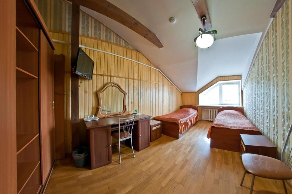Двухместный (Двухместный номер с 2 отдельными кроватями и общей ванной комнатой) мини-отеля Вояж, Вологда