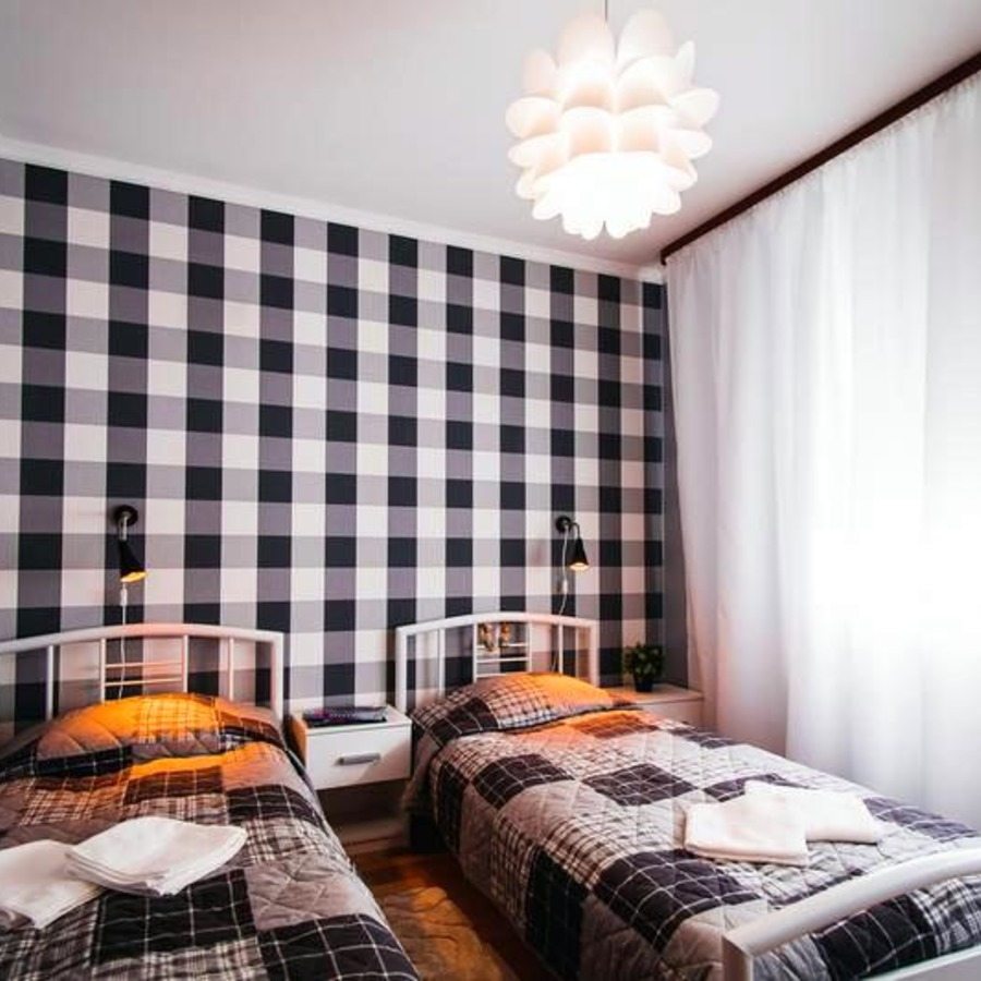 Двухместный (Двуместный номер с 2 отдельными кроватями и общей ванной комнатой) мини-отеля Три Зайца, Мурманск