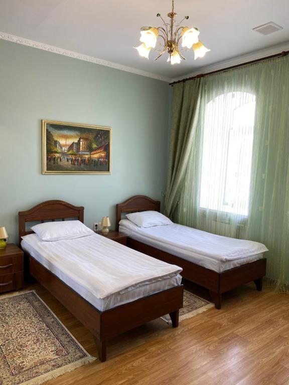 Двухместный (Улучшенный двухместный номер с 2 отдельными кроватями) отеля Никольский, Златоуст