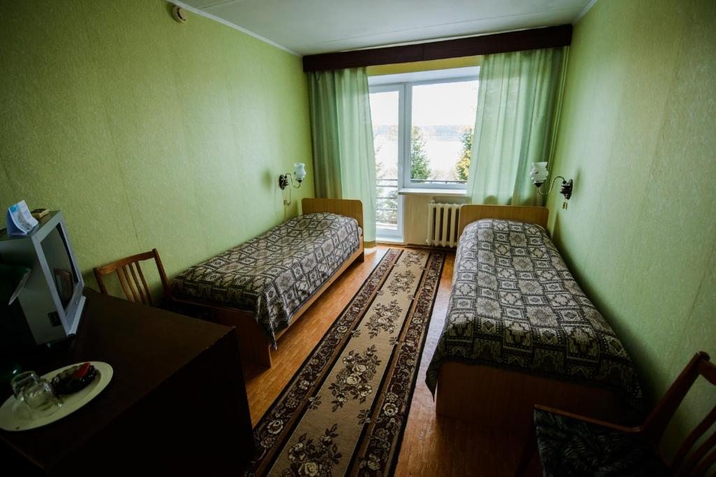 Двухместный (Бюджетный двухместный номер с 2 отдельными кроватями) гостиницы Таганай, Златоуст