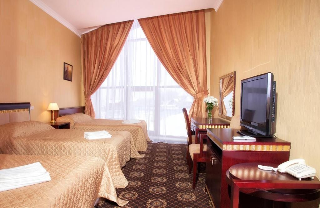 Двухместный (Бюджетный двухместный номер с 2 отдельными кроватями) отеля SK ROYAL Калуга