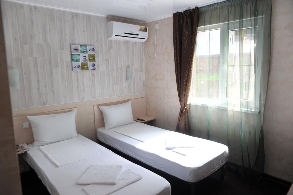 Двухместный (Двухместный номер с 2 отдельными кроватями) отеля Оранжевое Солнце, Лазаревское