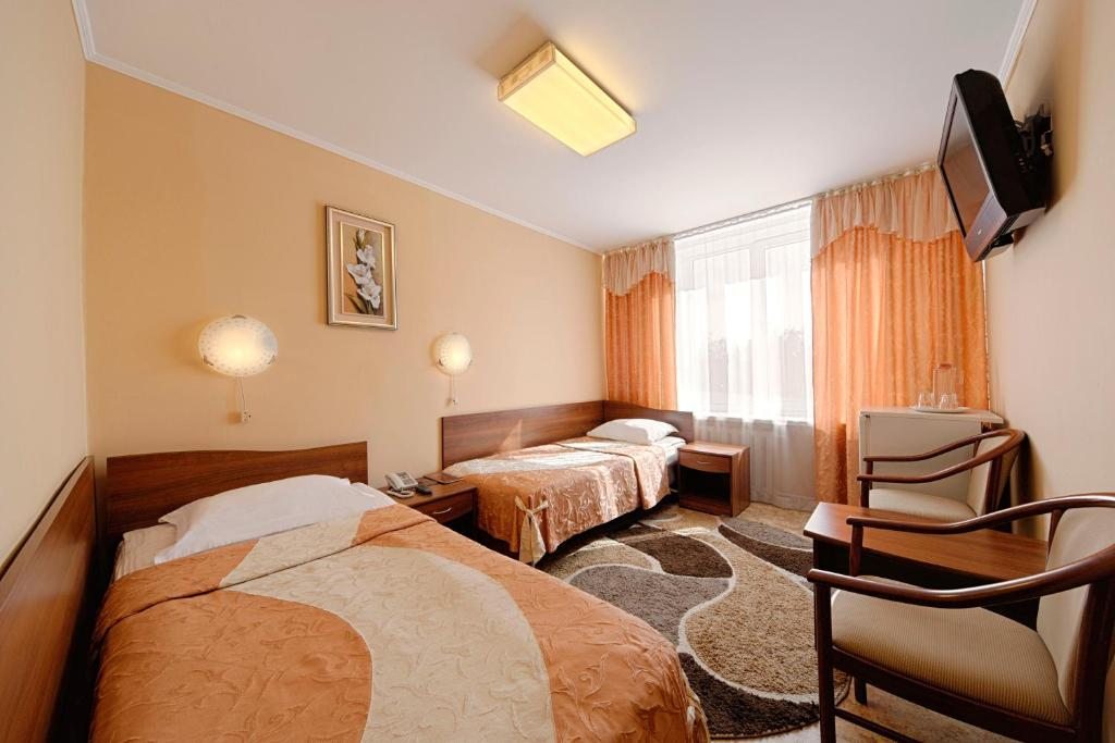 Двухместный (Односпальная кровать в общем номере с 2 кроватями) гостиницы Барнаул