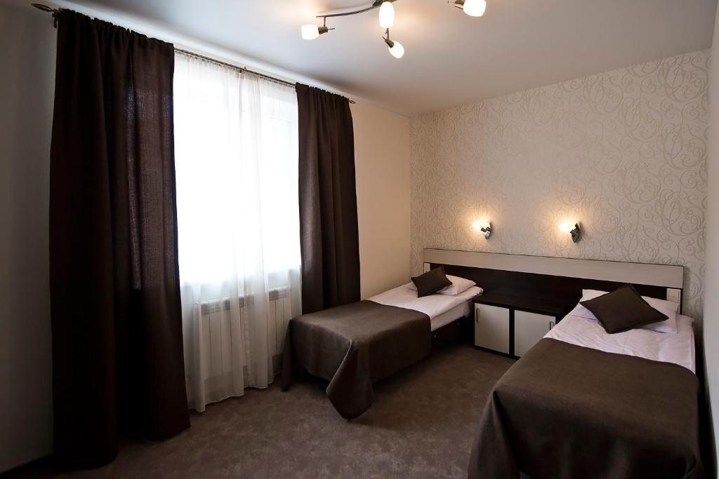 Двухместный (Двухместный номер с 2 отдельными кроватями, балконом и кондиционером) отеля Белая река, Гузерипль