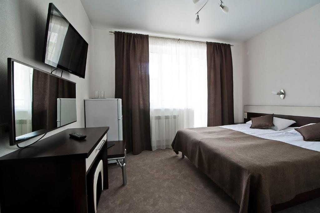 Двухместный (Двухместный номер Делюкс с 1 кроватью и балконом) отеля Белая река, Гузерипль