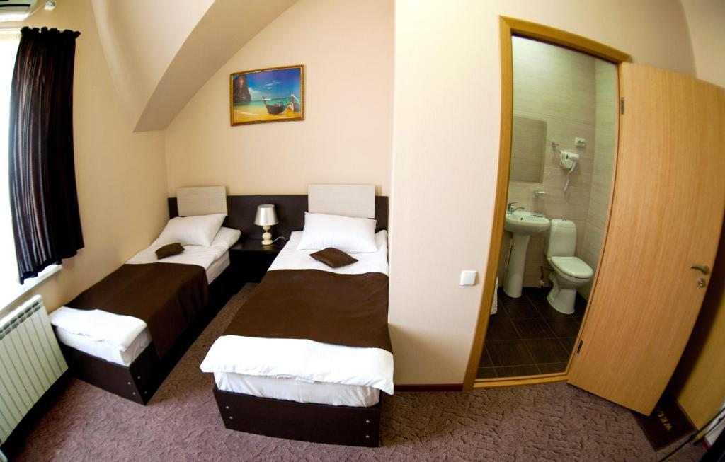 Двухместный (Двухместный номер с 2 отдельными кроватями) отеля Арт-Отель, Каменск-Шахтинский