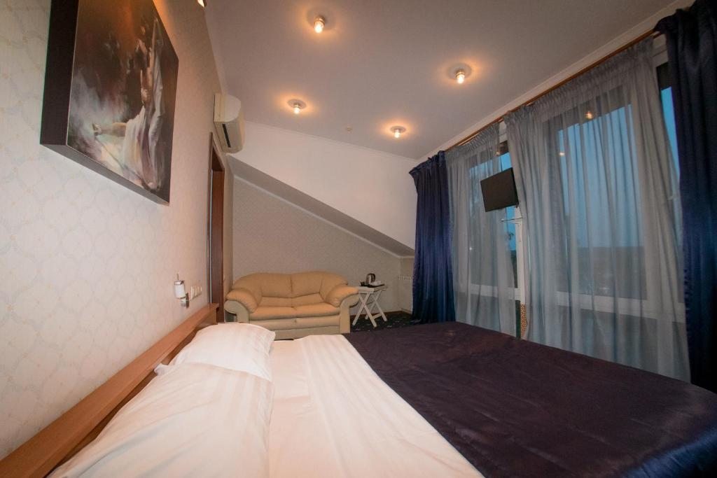 Двухместный (Улучшенный двухместный номер с 1 кроватью) гостевого дома Pride, Березники
