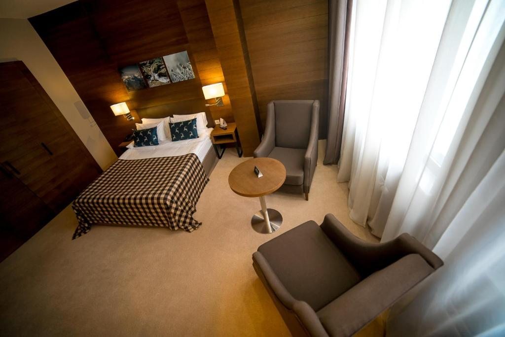 Двухместный (Улучшенный двухместный номер с 1 кроватью или 2 отдельными кроватями - Лечение включено) отеля Rosa Springs, Роза Хутор