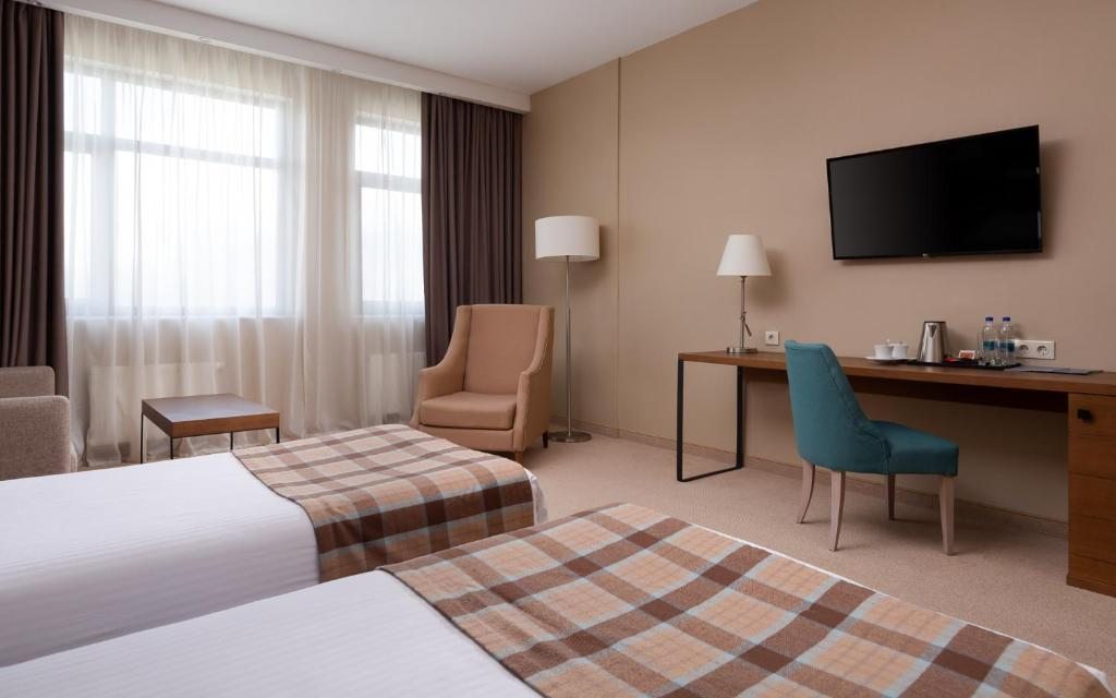 Двухместный (Улучшенный двухместный номер с 1 кроватью и диваном - Процедуры включены в стоимость) отеля Rosa Springs, Роза Хутор