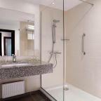 Ванная комната в номере отеля Кортъярд Марриотт Нижний Новгород Сити Центр

