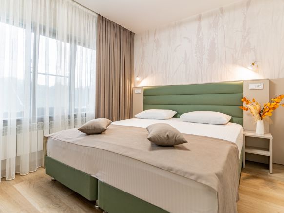 Фотография номера гостевого дома Терем у Реки