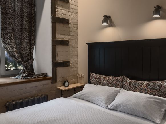 Фотография номера гостиницы Brick Walls