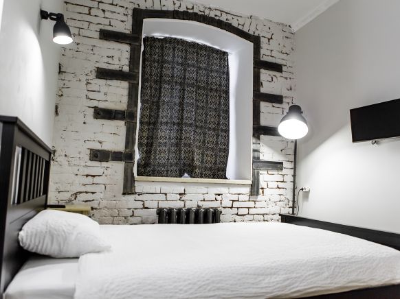 Фотография номера гостиницы Brick Walls