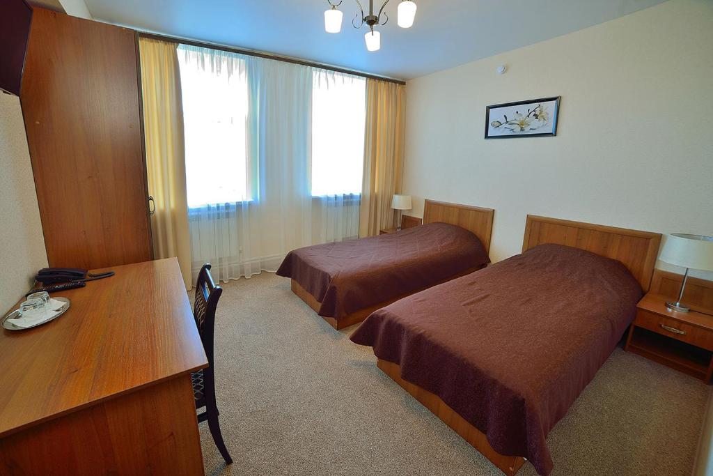 Двухместный (Двухместный номер эконом-класса с 2 отдельными кроватями) отеля Россия, Борисоглебск