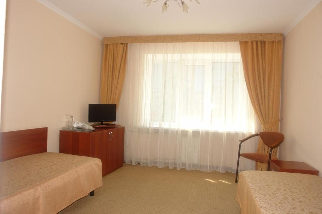 Двухместный (Стандартный двухместный номер с 2 отдельными кроватями) отеля Пятигорск