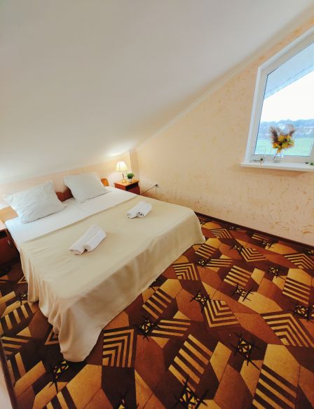 Фотография номера гостевого дома Альпийский Двор