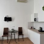 Семейный (С двуспальной кроватью, диваном и кухней), Boho Center Nevsky Hotel