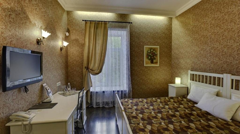 Двухместный (Улучшенный двухместный номер с 1 кроватью или 2 отдельными кроватями) отеля Шлиссельбургъ