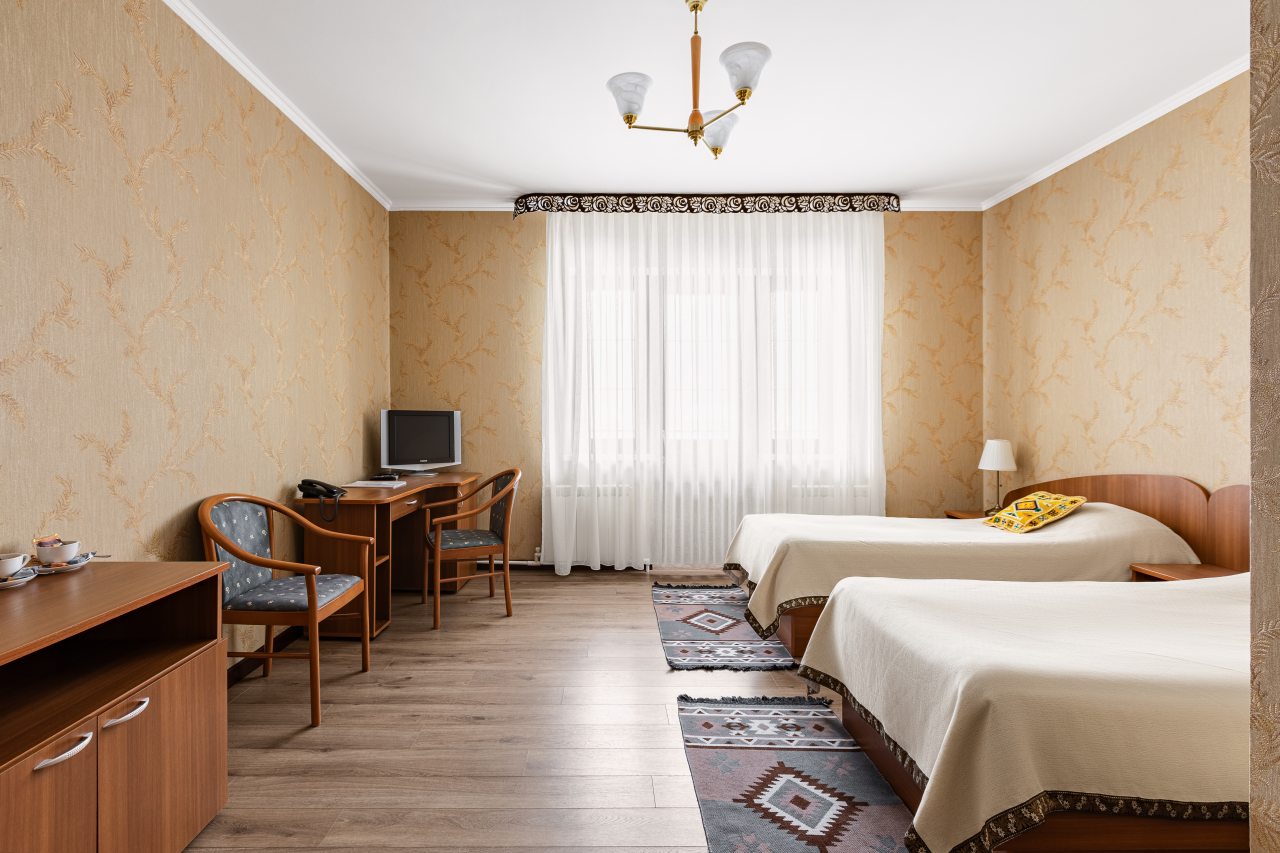 Двухместный (Стандартный двухместный номер с 1 кроватью или 2 отдельными кроватями) отеля Времена года Чегет, Терскол