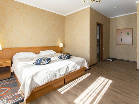 Фотография номера гостиницы Времена года Чегет