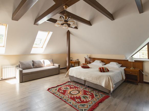 Фотография номера гостиницы Времена года Чегет