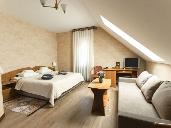 Фотография номера гостиницы Времена года Чегет