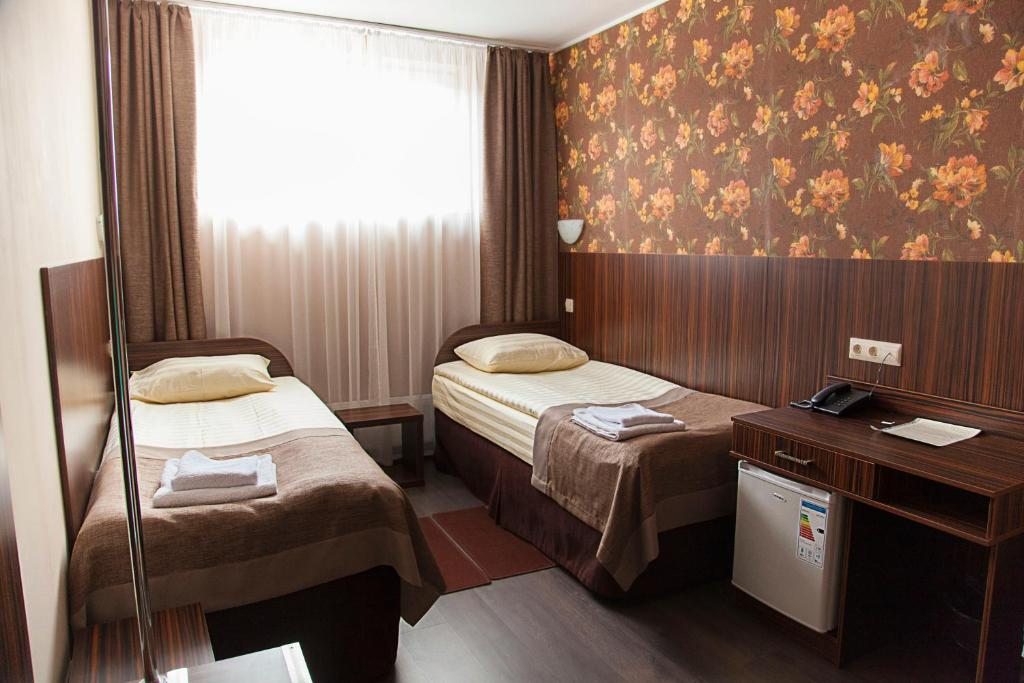 Двухместный (Двухместный номер с 2 отдельными кроватями) отеля Арль, Псков
